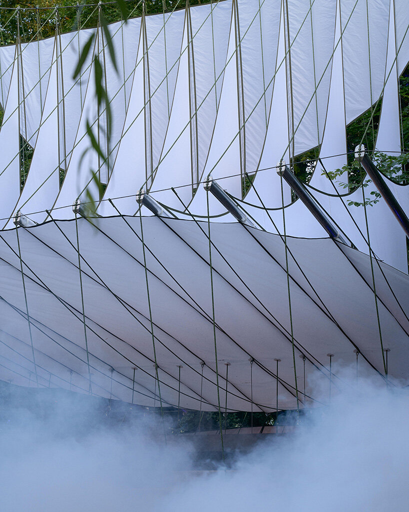 ZELT's curved rain-proof canopy ripples above dekmantel festival stage in the netherlands