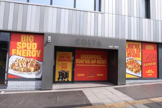 Signs on the site of the new Spud Bros store in Liverpool 