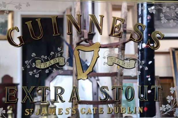 A Guinness mirror at Karma Antiques