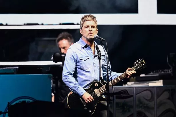 Oasis' Noel Gallagher on stage in Cardiff