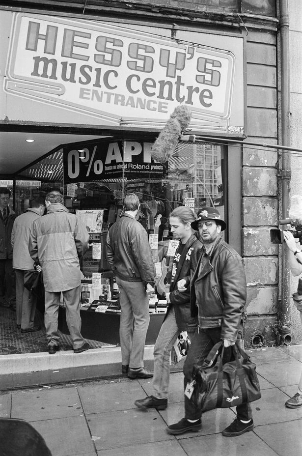 Former Beatles drummer Ringo Starr shows his son Jason some of his old haunts as they strolled down Mathew Street in central Liverpool. 30th September 1992.
