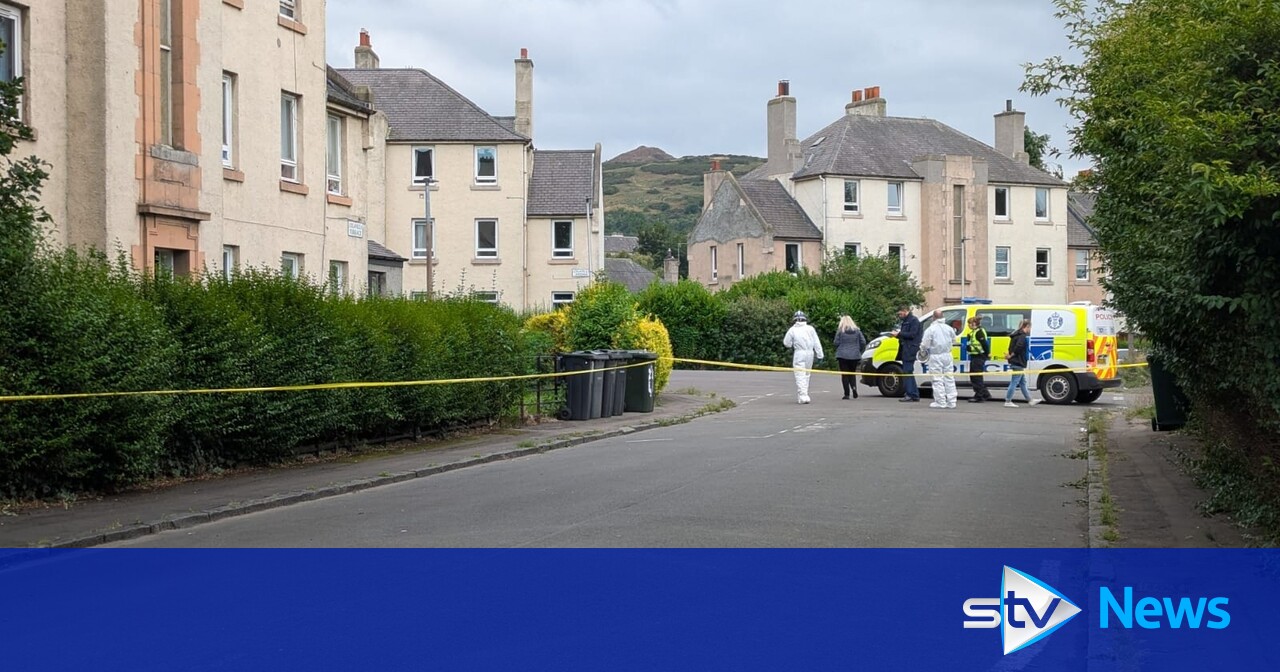 Armed police called to reports of men with gun in Edinburgh before flat fire discovered