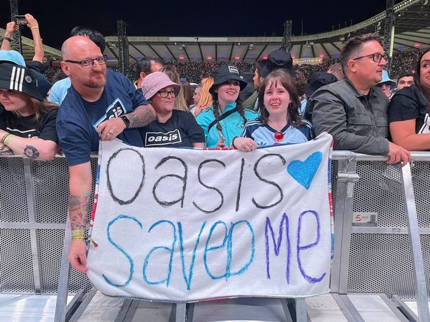 Jessica got to the front of the crowd with her homemade sign at the Oasis gig in Edinburgh