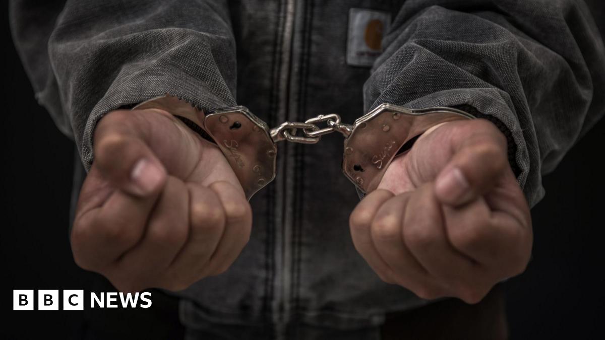 A man has handcuffs on