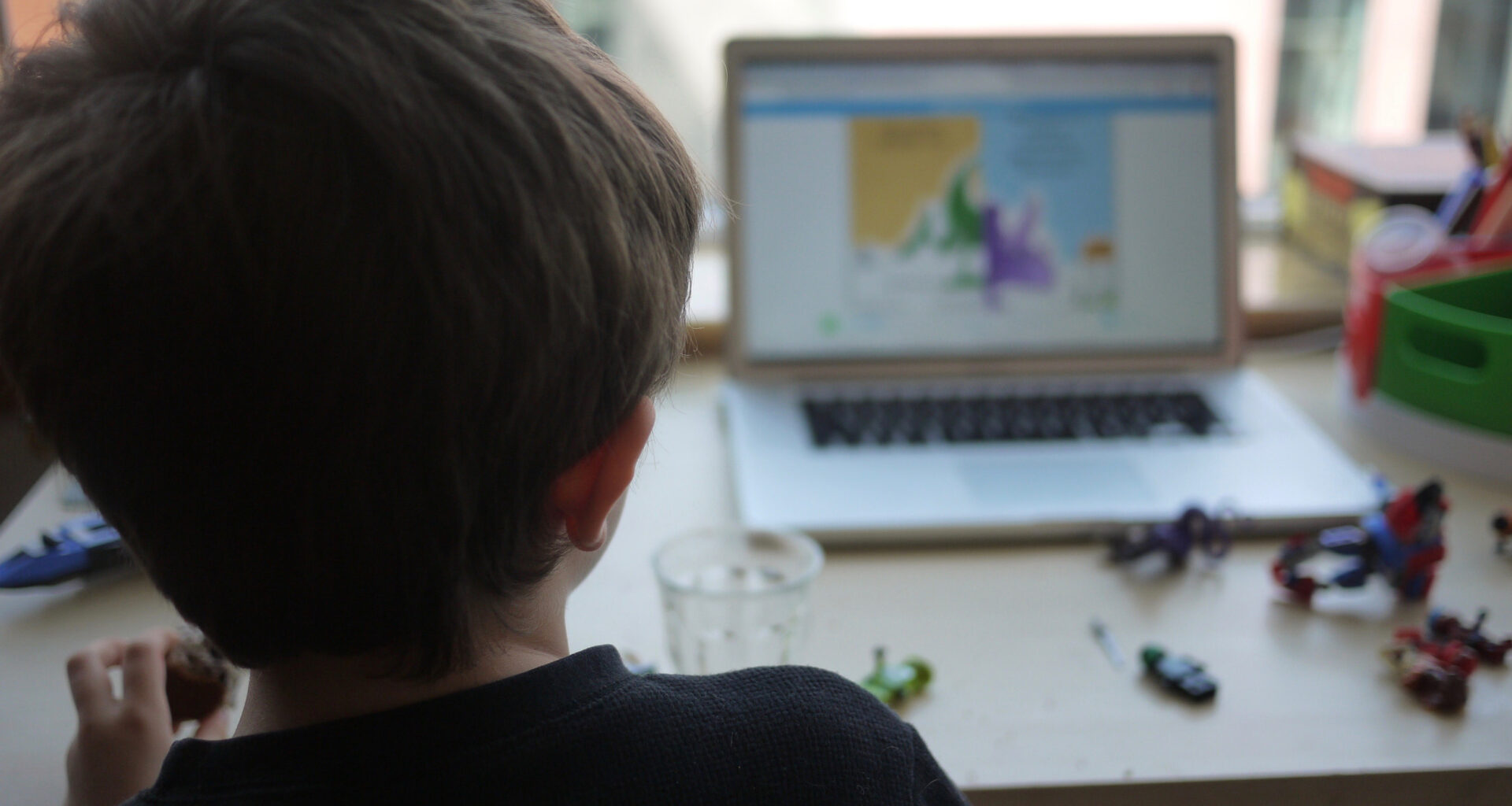 A young boy participates in an online