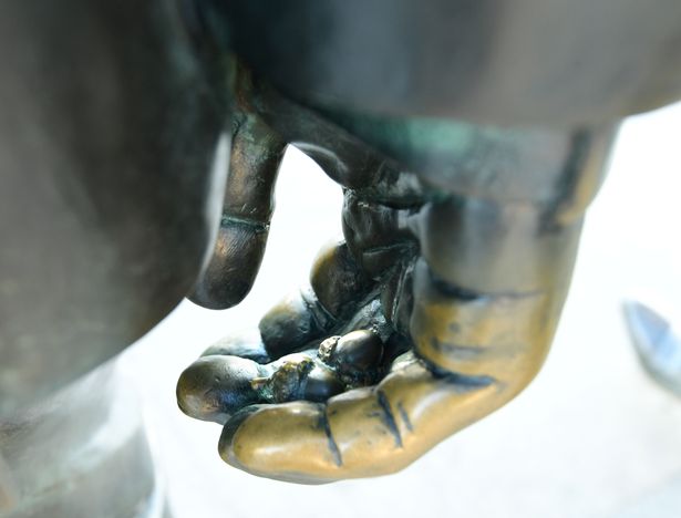 An acorn in the hand of John Lennon.(Pic Andrew Teebay).