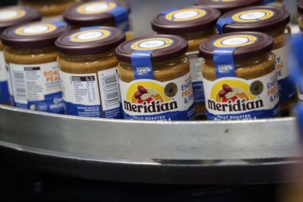 The image shows packaged and labelled jars ready to be sold in supermarkets