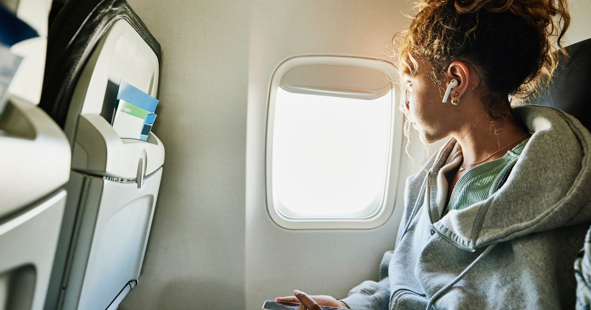 How To Calm Anxiety During Turbulence, According To Flight Attendants