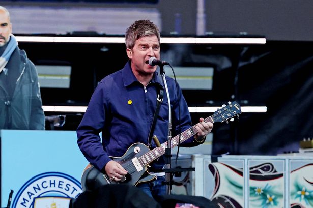 Noel Gallagher performing with Oasis in Ireland