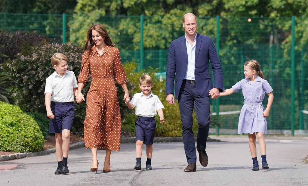 The Wales family at the school gates.
