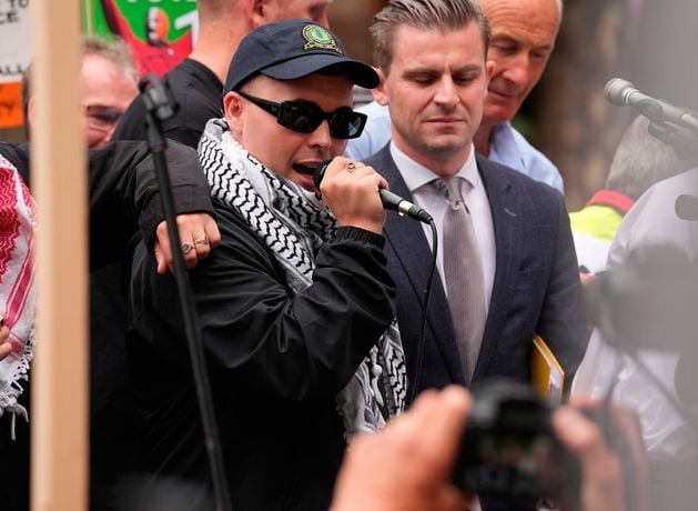 Kneecap's Mo Chara in court: Man arrested over support for Palestine Action after rapper’s terror case heard in London
