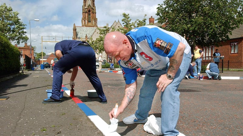 Notorious loyalist Johnny Adair image used to rally people in Britain to start ‘patriotic craze’ of kerb painting