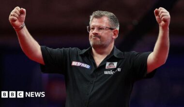 James Wade of England celebrates victory at Blackpool's Winter Gardens in July 2025