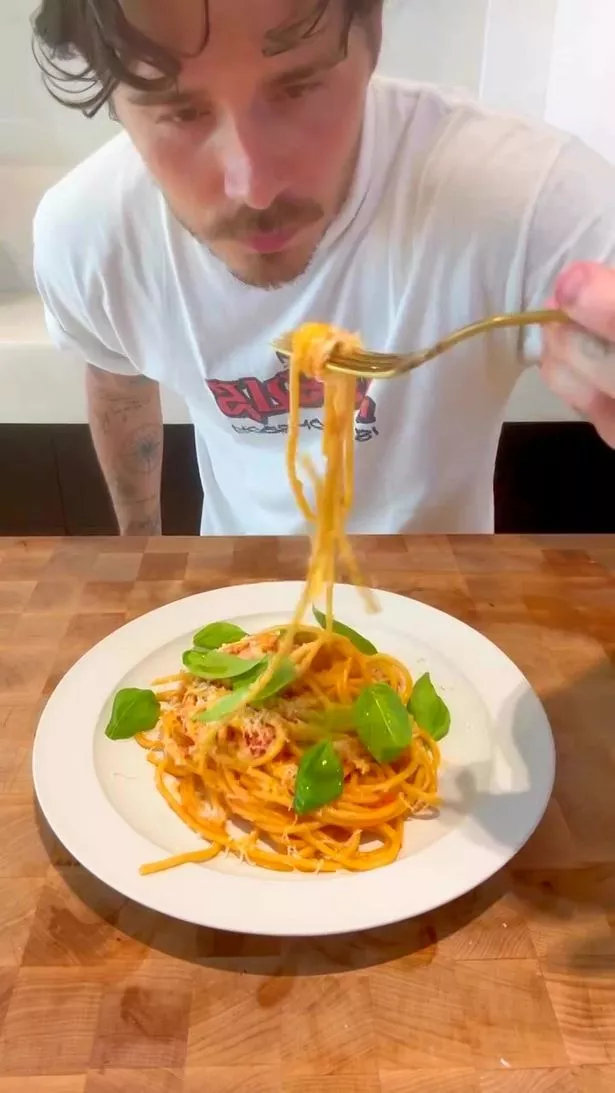 Brooklyn, 26, took his followers on a step-by-step process to make ‘a simple pasta sauce’ which he served up for his wife Nicola Peltz, complete with parmesan cheese and basil