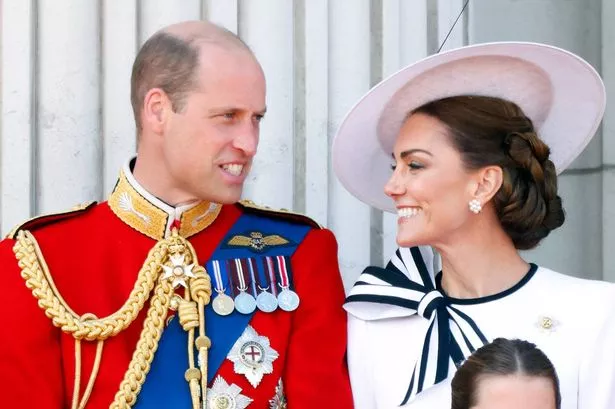Prince William, Prince of Wales (Colonel of the Welsh Guards) and Catherine, Princess of Wales watch an RAF flypast from the balcony of Buckingham Palace after attending Trooping the Colour on June 15, 2024 in London