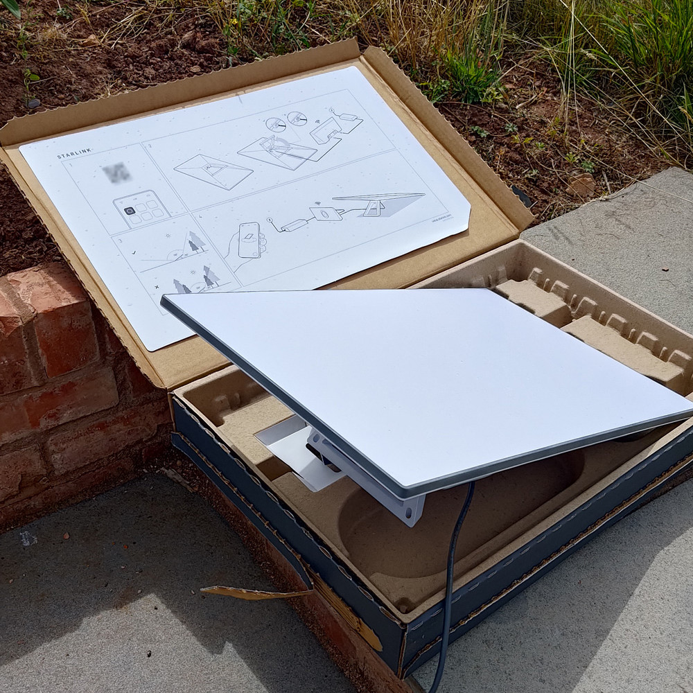 Starlink internet dish in original cardboard box just opened