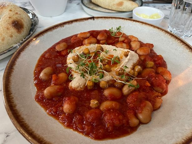 The butter bean stew topped with hummus