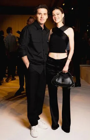 Pierre Mouton/Getty Brooklyn and Nicola Peltz Beckham in Paris in September 2024