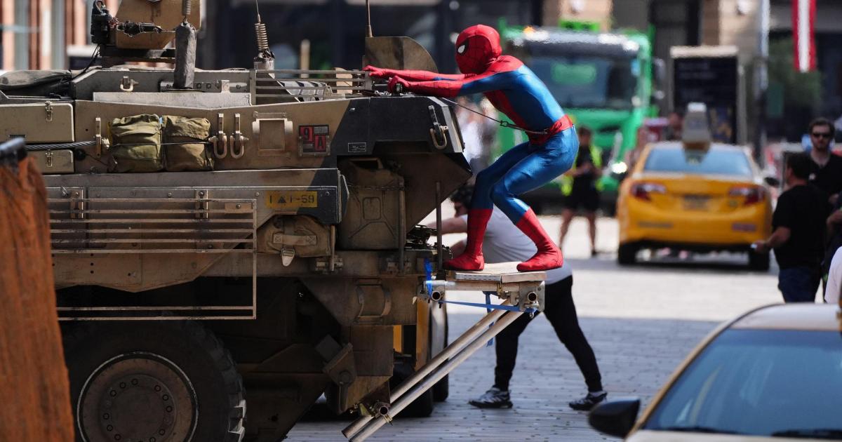 Spider-Man stunt double seen racing through Glasgow on tank