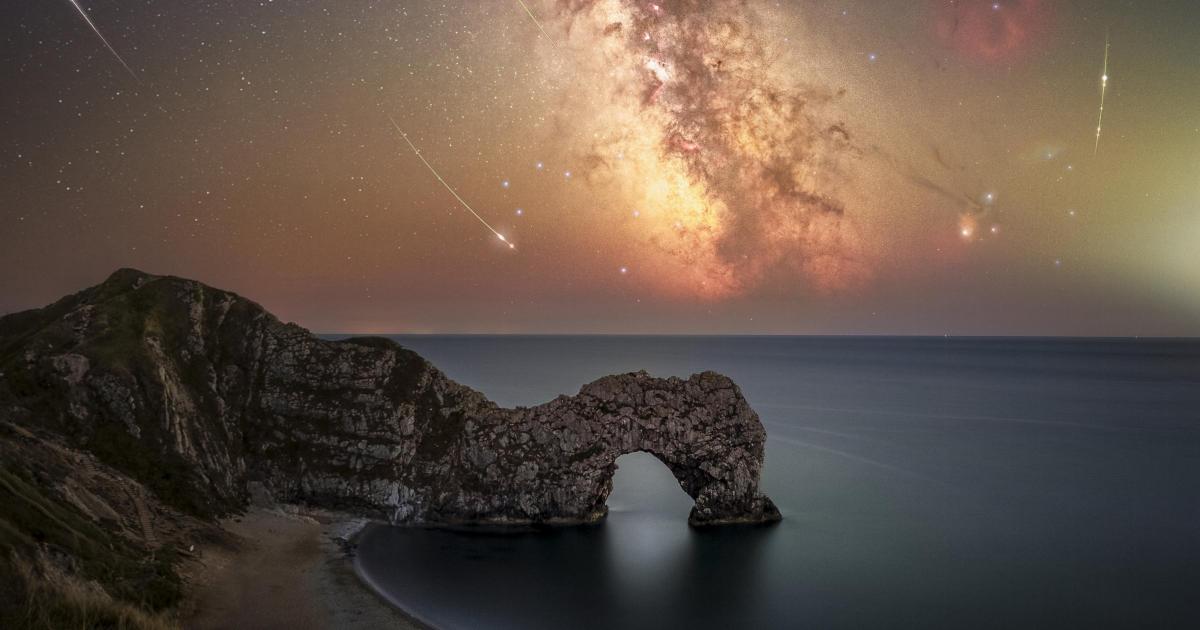 Perseid meteor shower captured over Durdle Door, Dorset