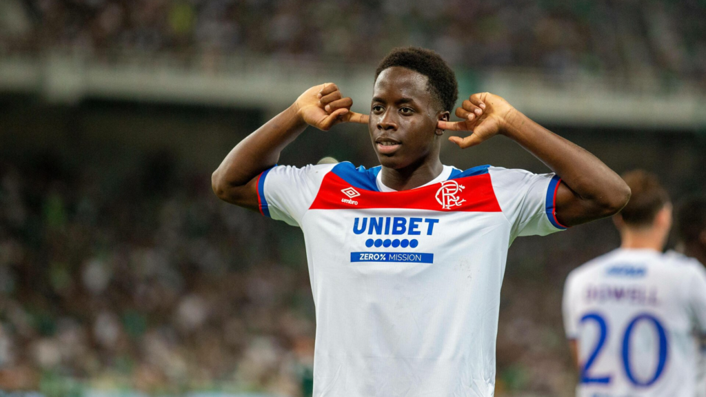 Rangers winger Djeidi Gassama puts his fingers in his ears after scoring against Panathinaikos.