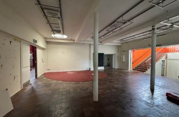 How the foyer of the former St Ambrose Barlow RC High looks now - with the fresco covered by emulsion and plaster.