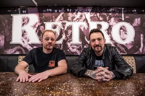 Retro Bar owner Mark Armor with musician Frank Turner