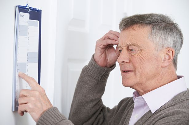 An older man looking confused