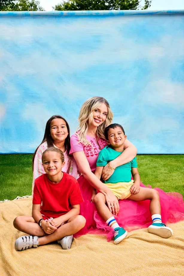 Helen Flanagan and kids in garden