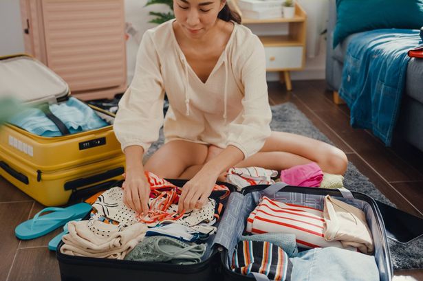 Person packing for a holiday
