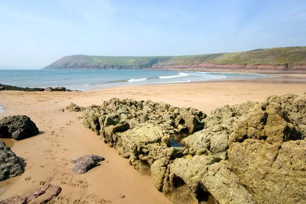 A beach and rocks