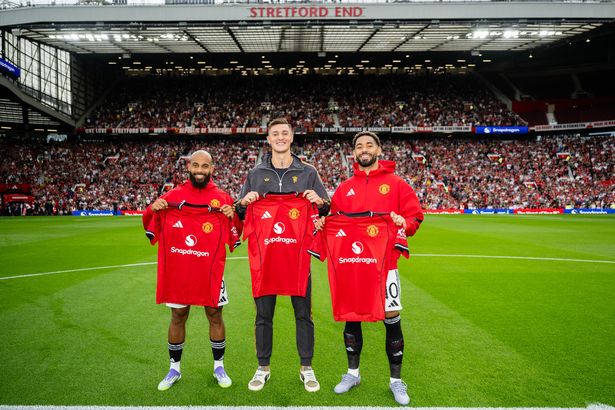 New Manchester United signings Bryan Mbeumo, Benjamin Sesko and Matheus Cunha pose together with team shirts prior to the pre-season friendly match between United and Fiorentina