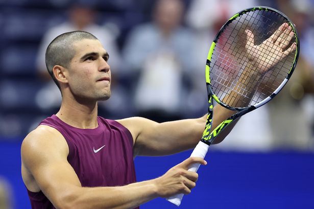 NEW YORK, NEW YORK - AUGUST 25: Carlos Alcaraz of Spain celebrates after defeating Reilly Opelka of the United States during their Men's Singles First Round match on Day Two of the 2025 US Open at USTA Billie Jean King National Tennis Center on August 25, 2025 in the Flushing neighborhood of the Queens borough of New York City. (Photo by Elsa/Getty Images)