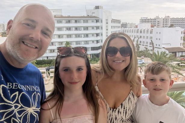 William White with his wife and two children on holiday