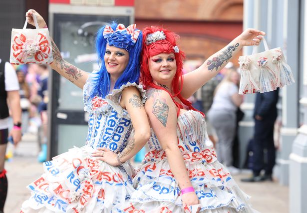 Mother-and-daughter duo Penny and Jodie Overbury, dressed in their very own custom Tesco bag dresses at Manchester Pride 2025