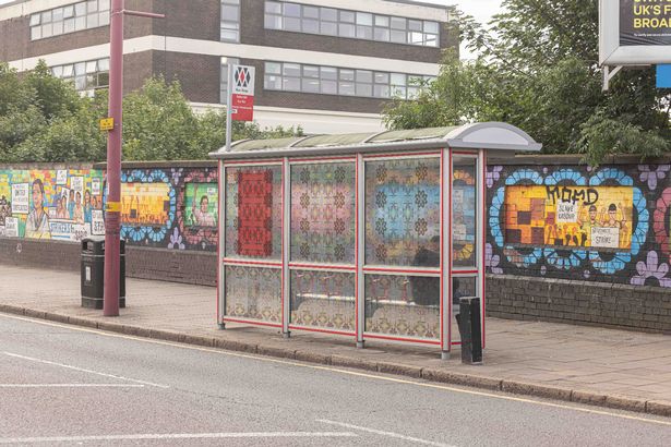 Bus stop with decoration designed by the community - however it now obscures anti social behaviour.