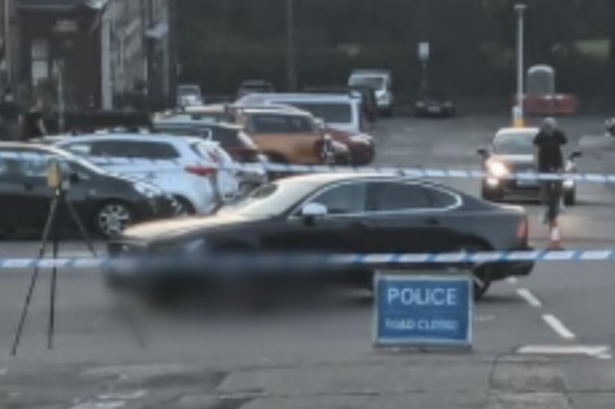 Police remain at the scene.