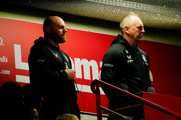 John Carwtright and Simon Grix watch Hull FC's win over Catalans. 