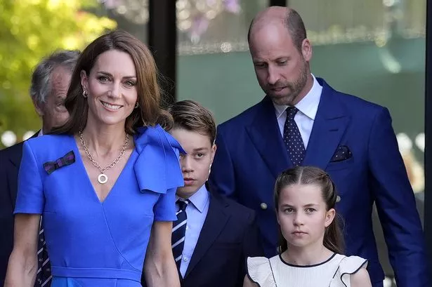 Britain's Catherine, Princess of Wales (L), Britain's Princess Charlotte of Wales (front R), Britain's Prince George of Wales (C) and Britain's Prince William, Prince of Wales (rear R) arrive to attend the men's singles final tennis match between Italy's Jannik Sinner and Spain's Carlos Alcaraz on the fourteenth day of the 2025 Wimbledon Championships at The All England Lawn Tennis and Croquet Club in Wimbledon, southwest London, on July 13, 2025. (Photo by Andrew Matthews / POOL / AFP) / RESTRICTED TO EDITORIAL USE (Photo by ANDREW MATTHEWS/POOL/AFP via Getty Images)          