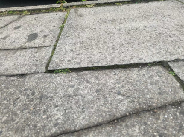 Helen fell over the uneven paving
