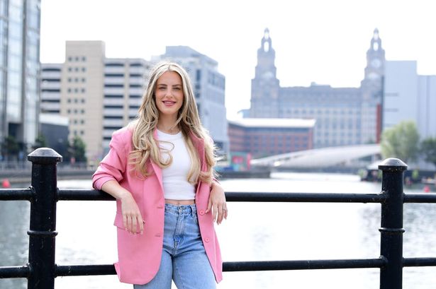 Elly Gordon pictured in front of Princes Dock, Liverpool