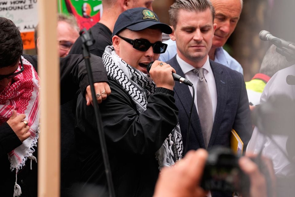 Kneecap's Liam Og O hAnnaidh, speaks to supporters as he leaves Westminster Magistrates' Court. Photo: Lucy North/PA Wire