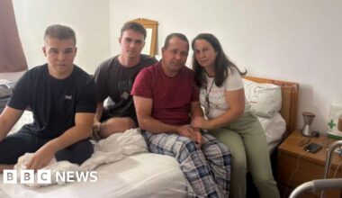 Ukrainian family forced to lift father down stairs due to broken lift