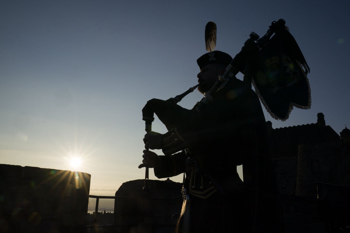Lone piper plays at Edinburgh Castle to mark 80th anniversary of VJ Day