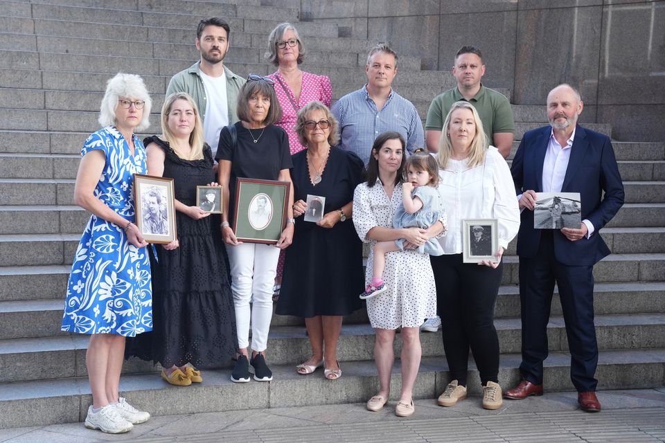 Families of those killed in the 1994 Chinook crash (l to r front) Nicola Rawcliffe, Esme Sparks, Gaynor Tobias, Susan Phoenix, Lucy and Cleo Sparks, Jenni Balmer Hornby and Chris Cook, (l to r back) Andy Tobias, Sue Angus, Niven Phoenix and Matt Tobias, before meeting their legal team in central London (Jonathan Brady/PA)