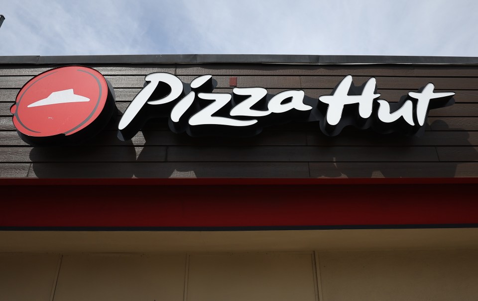 Pizza Hut restaurant sign.