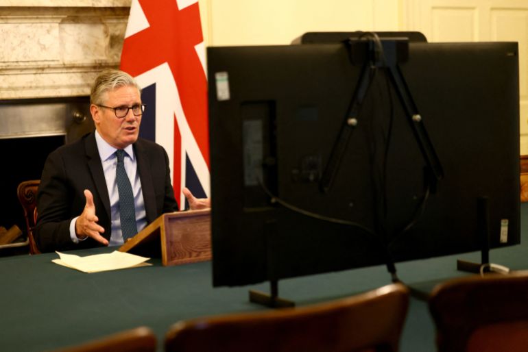 Britain's Prime Minister Keir Starmer co-chairs the Coalition of the Willing videoconference call with European leaders on Ukraine, ahead of the expected meeting of U.S. President Donald Trump and Russia's President Vladimir Putin in Alaska, in London, Britain, August 13, 2025. REUTERS/Jack Taylor/Pool