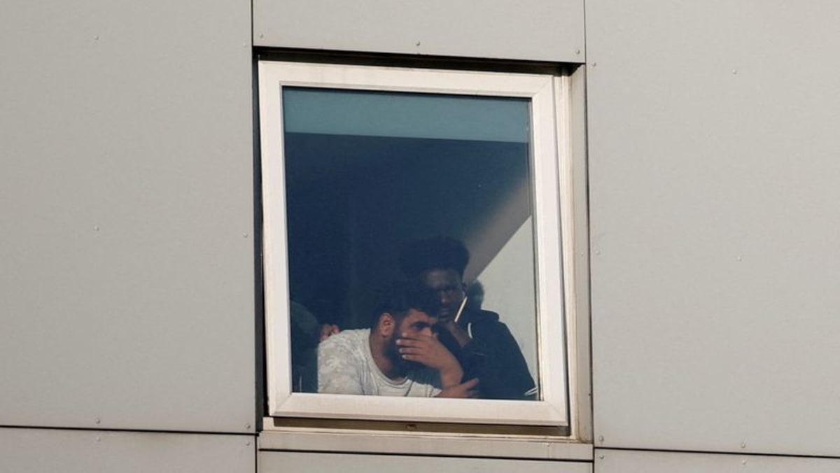 UK vows to speed up asylum claims as hotel protests spread