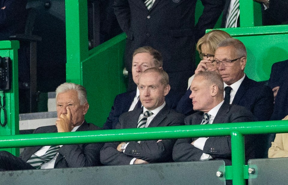 Peter Lawwell and Michael Nicholson seated in stadium stands.