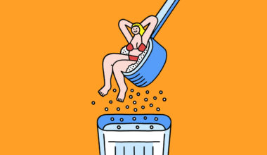 A person sitting in an oversized scoop of powder being poured into a glass